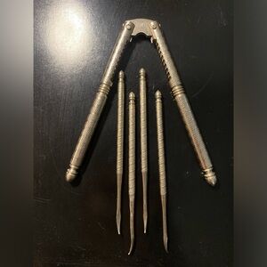 Vintage Ornate Metal Nutcracker with Picks - Silver Tone